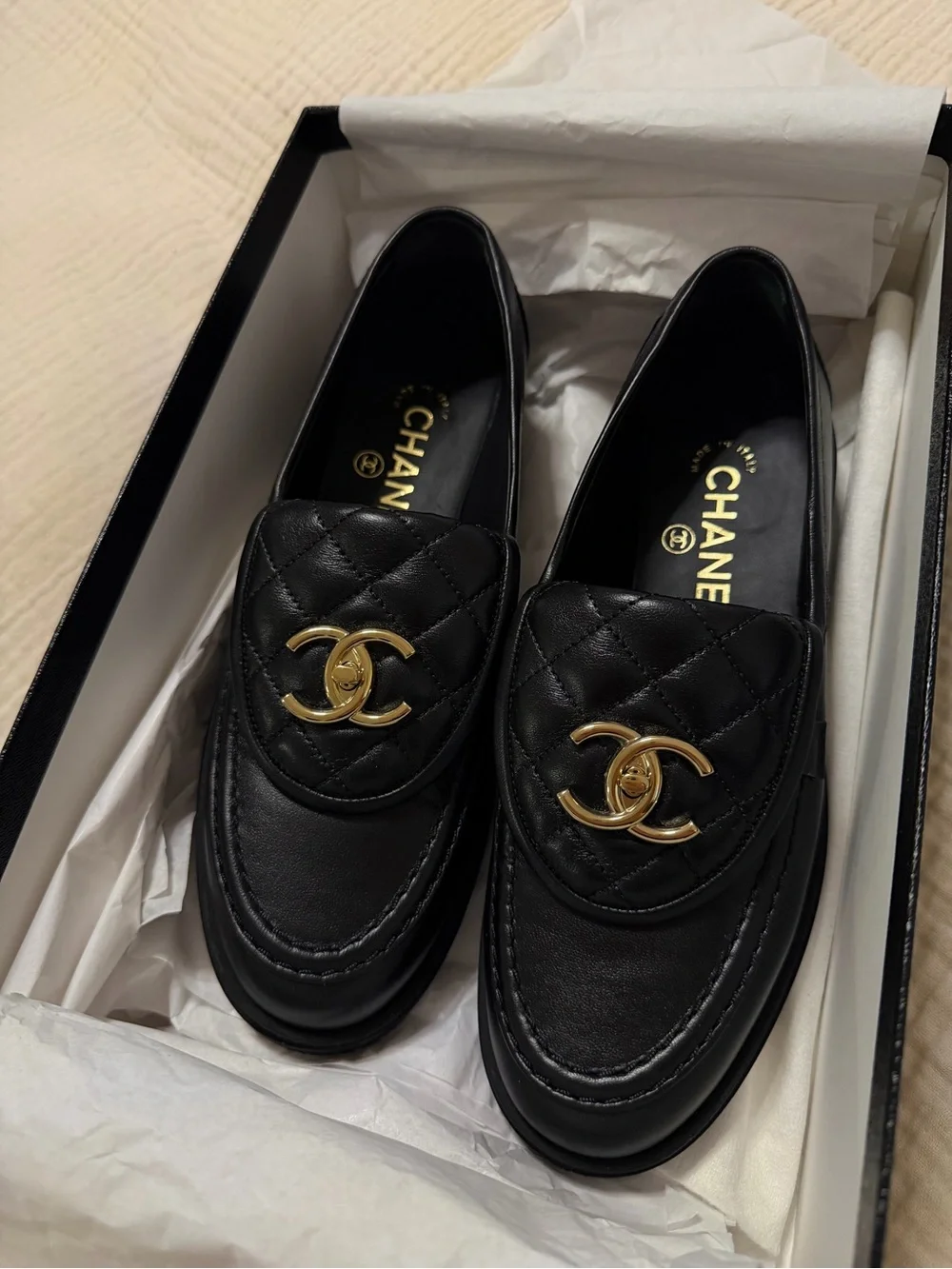 CHANEL Black Quilted Leather Loafers with Gold CC Emblem